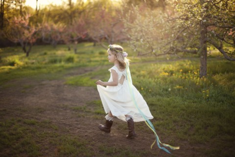 Caucasian girl walking on dirt path
