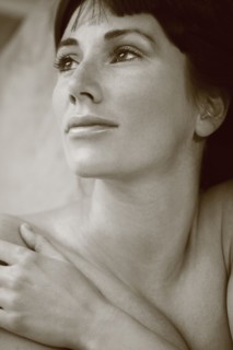 Nude Caucasian woman looking up