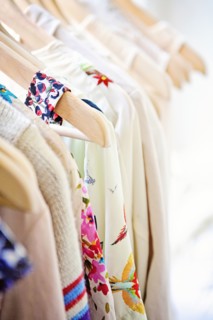 Close up of shirts on hangers