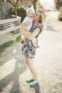 Mother holding son outdoors