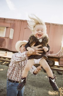 Father and daughter playing outdoors
