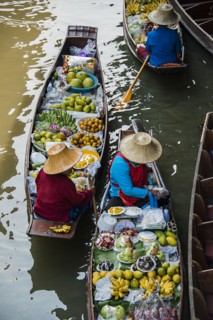 High angle view of merchants selling fruit in canoes