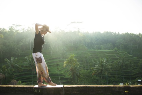 Caucasian tourist over rural rice terrace