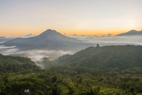 Hilltops over morning fog in remote landscape