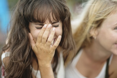 Close up of Caucasian woman laughing