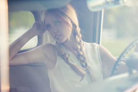 Caucasian woman driving car