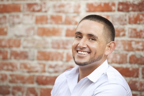 Smiling Hispanic man