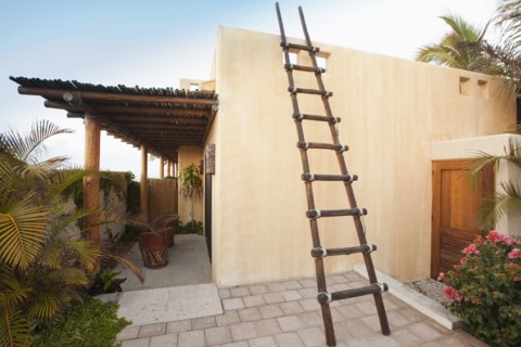 Ladder on Mexican style home