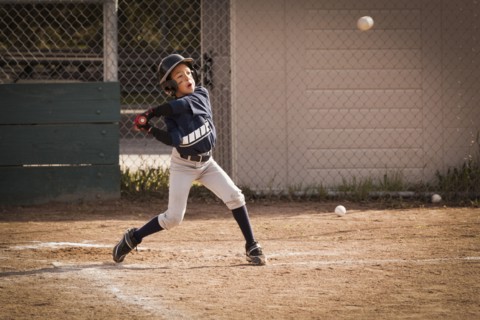 African American boy playing baseball