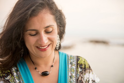 Hispanic woman looking down