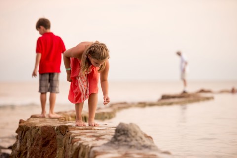 Children playing on jetty