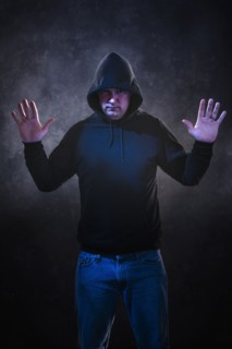 Caucasian man wearing black hoodie