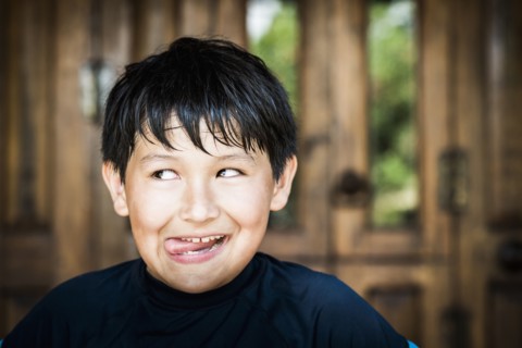 Hispanic boy making face