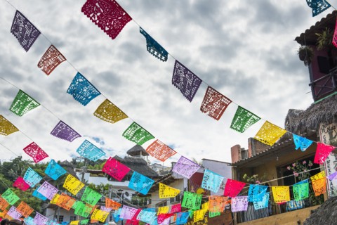 Prayer flags hanging over town streets