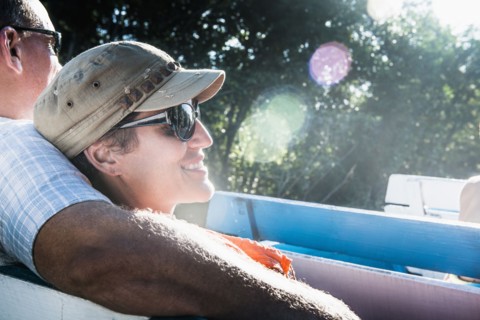 Couple relaxing in boat