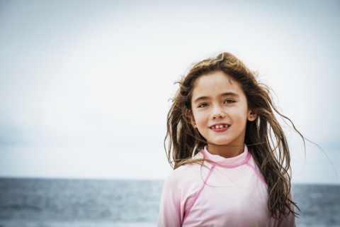 Asian girl near ocean