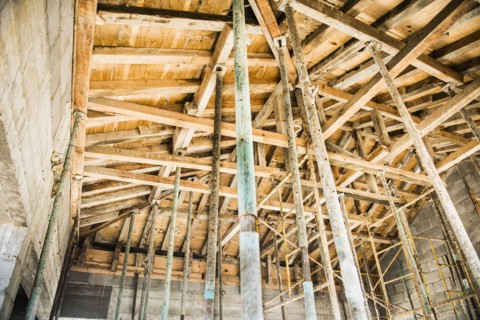 Low angle view of wooden house frame