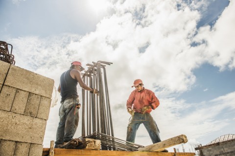 Hispanic construction workers at construction site