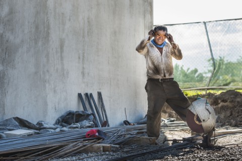 Hispanic construction worker at construction site