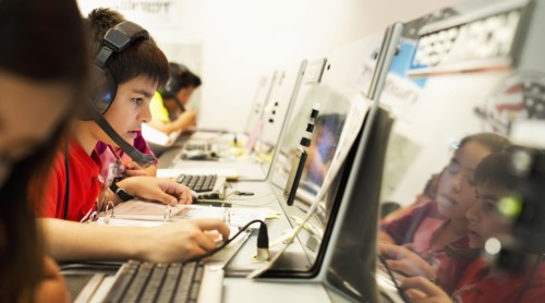 Students using computers at desk