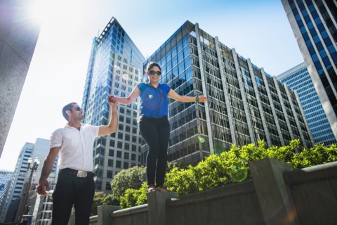 Hispanic couple walking in city