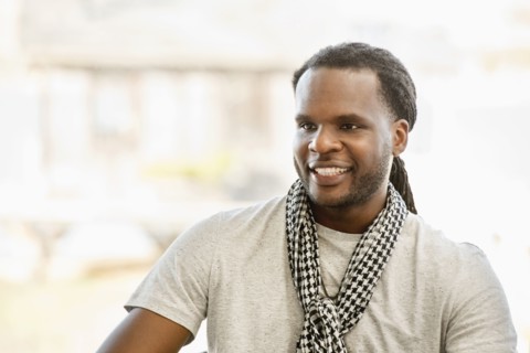 African American man smiling indoors