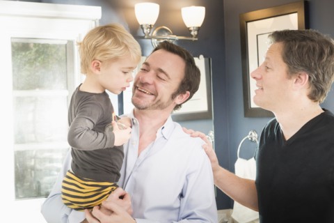 Caucasian fathers comforting son