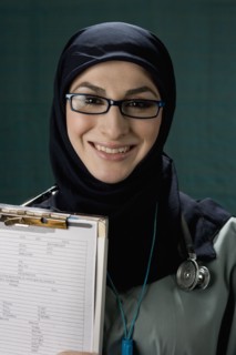 Middle Eastern doctor holding medical chart