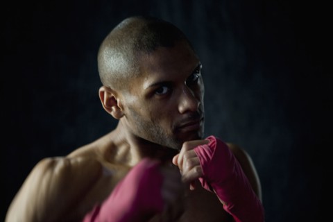 Hispanic boxer warming up