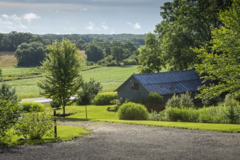 Barn building on farm in rural landscape