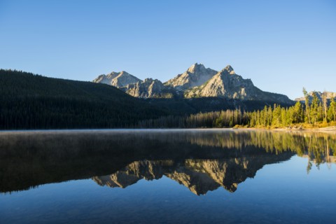 Mountain reflecting in still lake