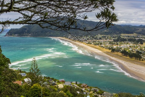 High angle view of beach and Whittianga cityscape