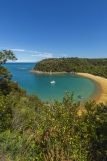 High angle view of boats in remote beach cove