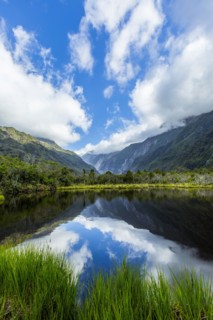Mountains reflecting in remote lake