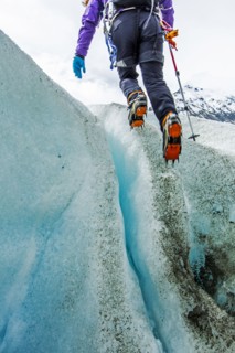Caucasian ice climber on glacier