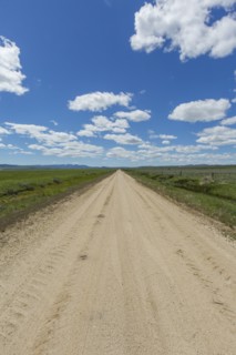 Dirt road toward mountains