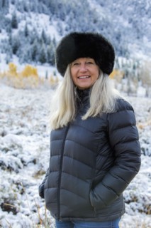 Caucasian woman wearing fur hat in winter