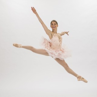 Caucasian woman ballet dancing
