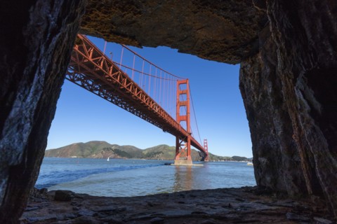 Rocks framing Golden Gate Bridge