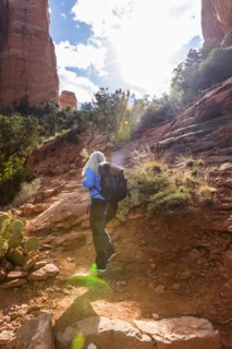 Caucasian woman hiking in desert landscape