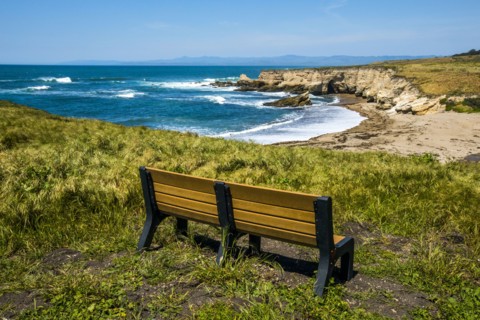 Bench overlooking ocean cove
