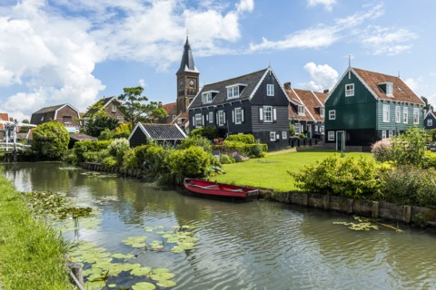 Rowboat in canal at traditional village