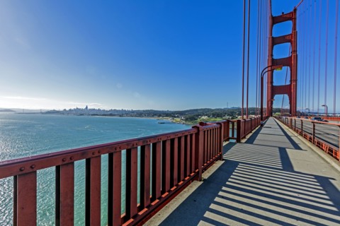 Shadows on walkway of bridge
