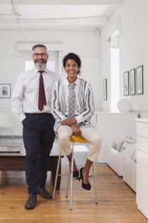Portrait of smiling businessman and businesswoman