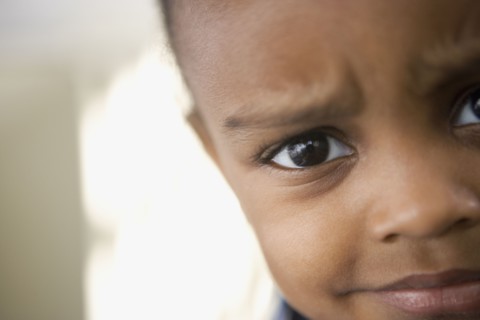 Frowning African boy