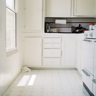 White apartment kitchen cabinets