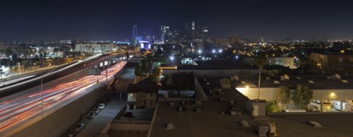 Aerial view of traffic on highway in Los Angeles cityscape