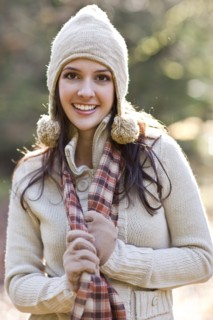 Mixed race woman in cap