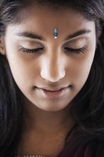 Indian woman with jewel on forehead