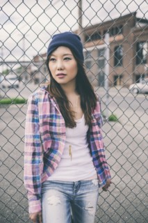 Korean woman standing on city street